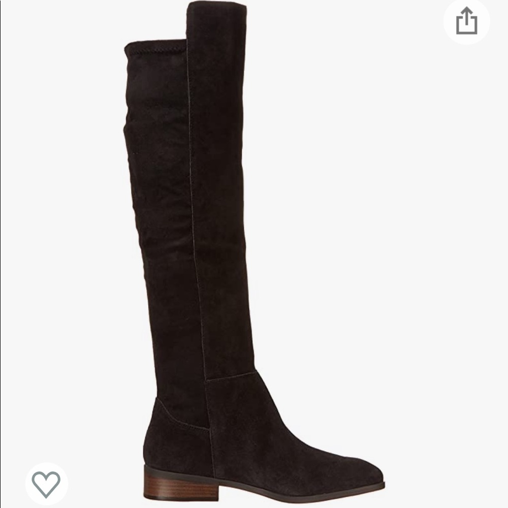 Over the knee black suede boots.
